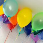 helium filled ceiling balloons in mix colours.
