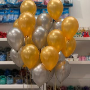 Large helium bunch of 24 gold and silver pearlised helium balloons.